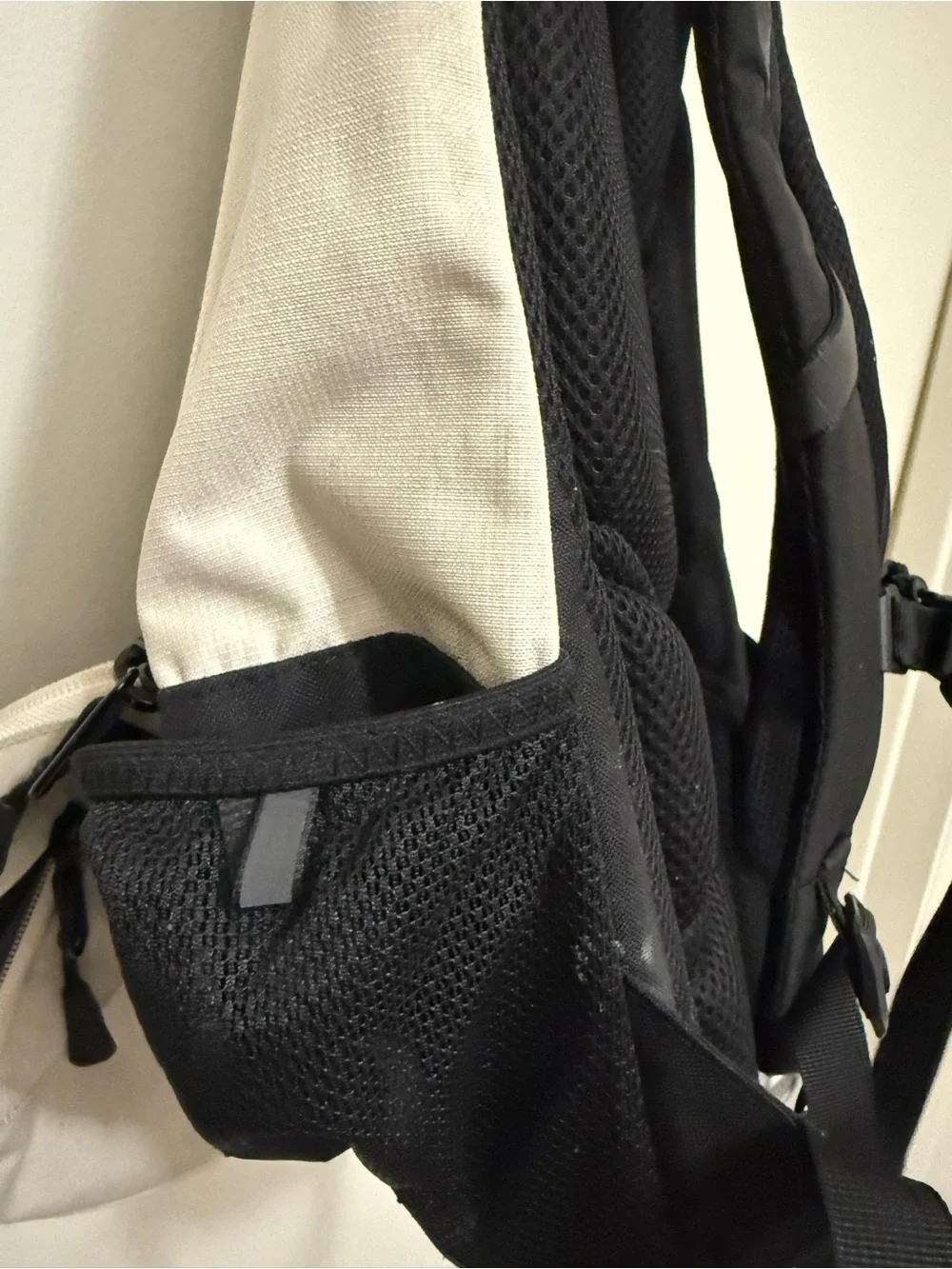 The North Face Two-Tone Beige and Black Backpack with Bungee Front